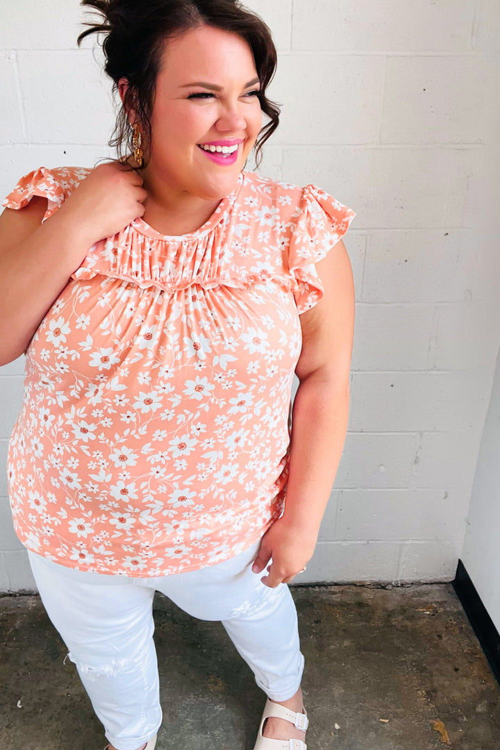 Peach Floral Print Frilled Shorts Sleeve Yoke Tops | Nikki &amp; Co. Boutique