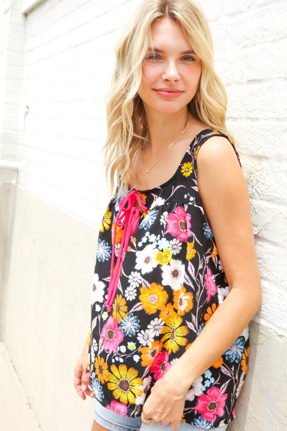 Flower Power Black Sleeveless Babydoll Bow Tie Tops - Nikki &amp; Co. Boutique