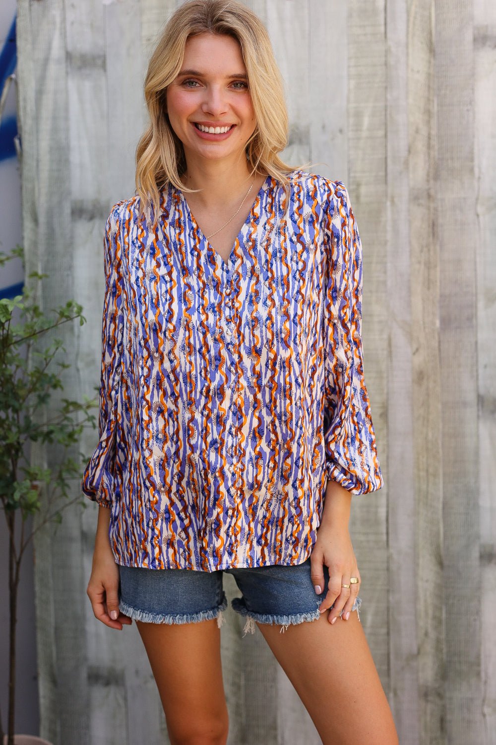 On A Wild Streak V Neck Fabric Button Detail Blouse - Nikki &amp; Co. Boutique