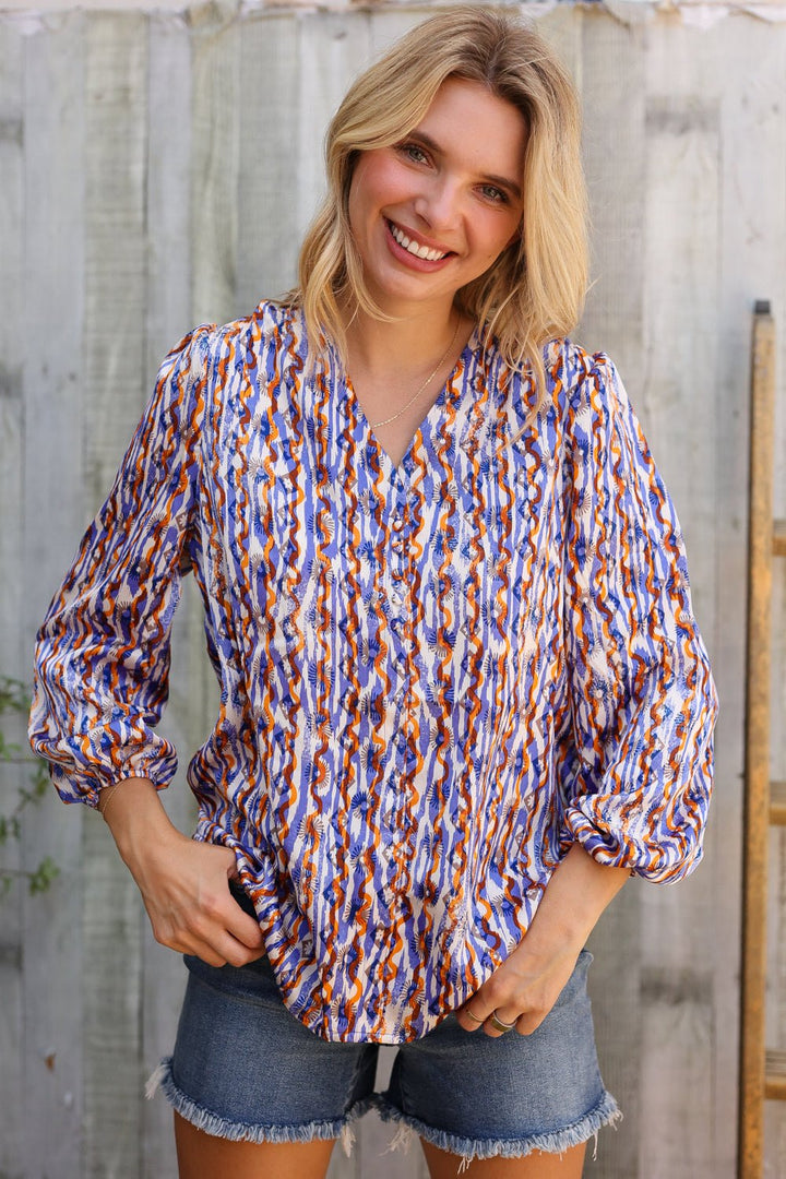 On A Wild Streak V Neck Fabric Button Detail Blouse - Nikki &amp; Co. Boutique