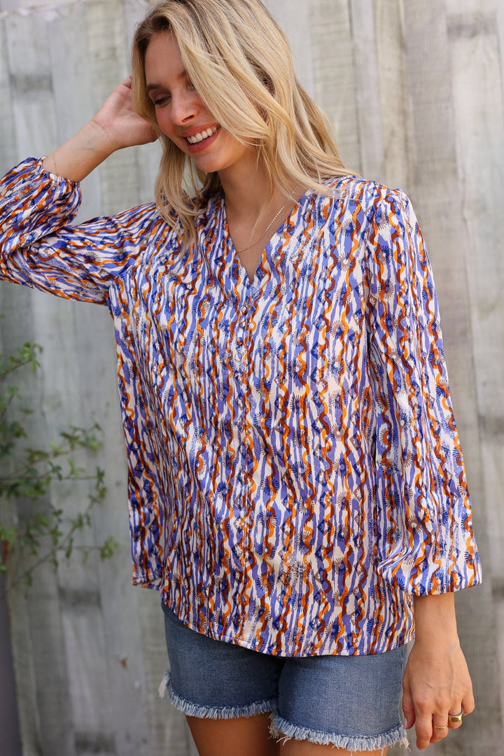 On A Wild Streak V Neck Fabric Button Detail Blouse - Nikki &amp; Co. Boutique