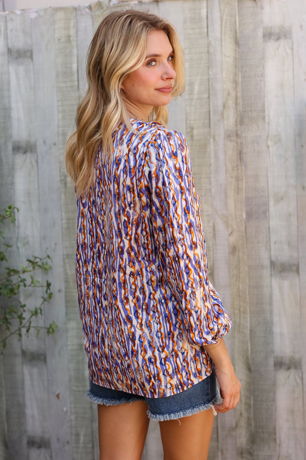 On A Wild Streak V Neck Fabric Button Detail Blouse - Nikki &amp; Co. Boutique
