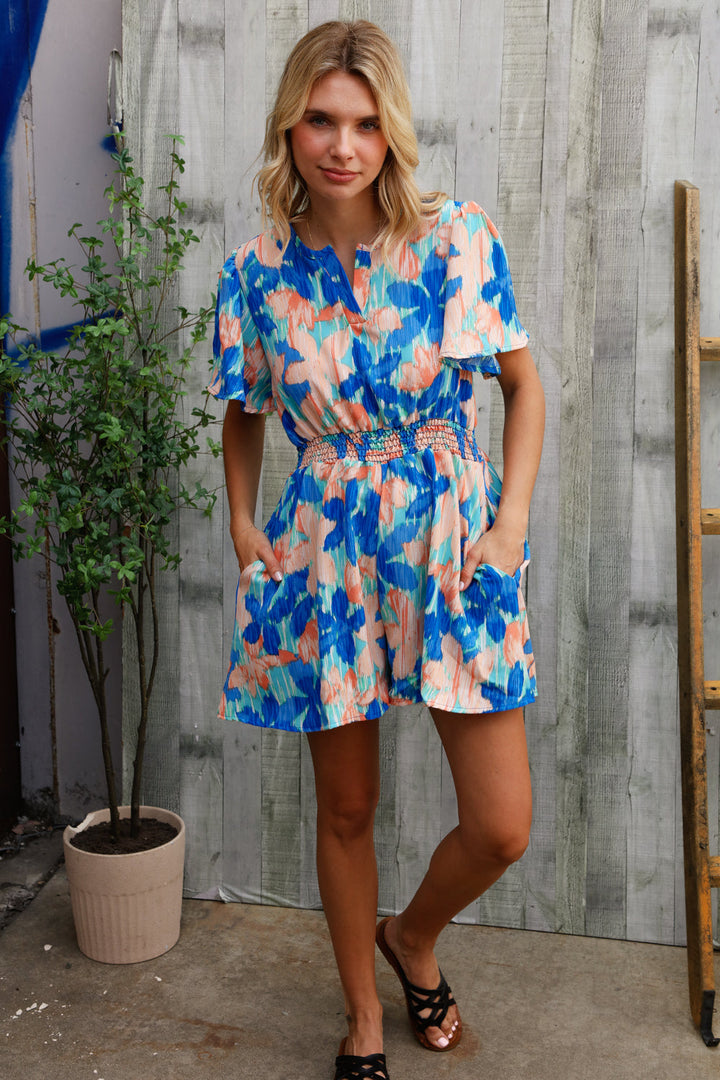 Feeling Bold Turquoise Floral Smocked Waist Flutter Sleeve Romper | Nikki &amp; Co. Boutique