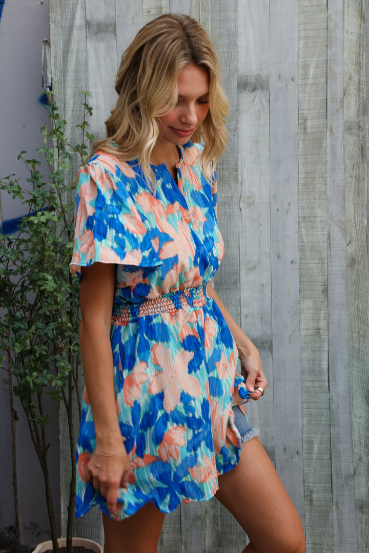 Feeling Bold Turquoise Floral Smocked Waist Flutter Sleeve Romper | Nikki &amp; Co. Boutique