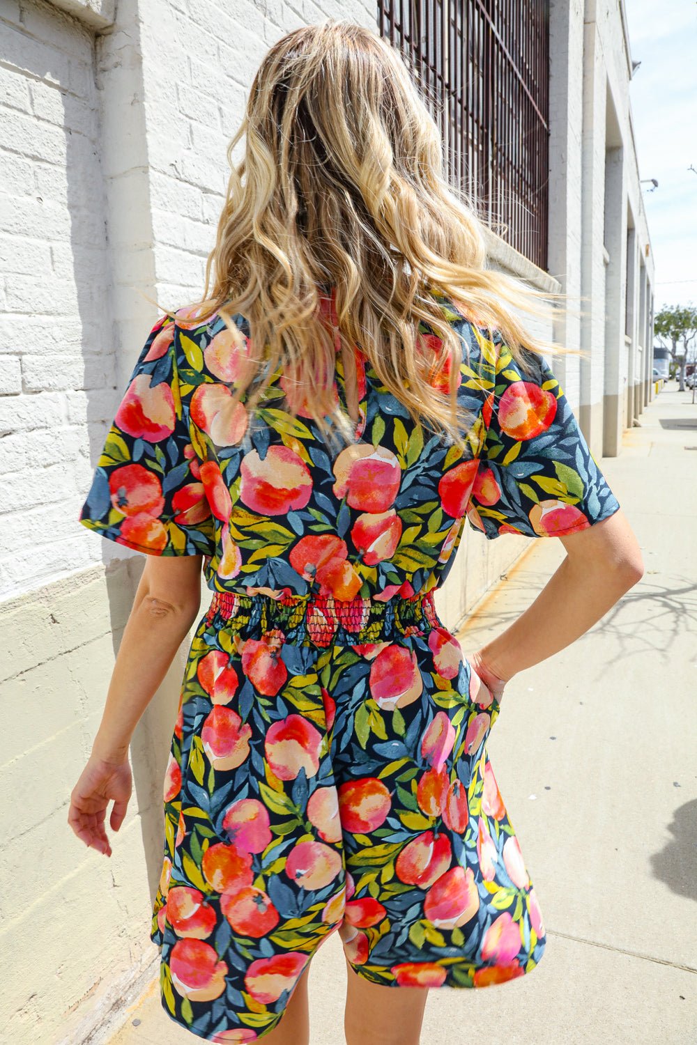 Sunny Days Floral Print Smocked Waist Back Neck Button Romper - Nikki &amp; Co. Boutique