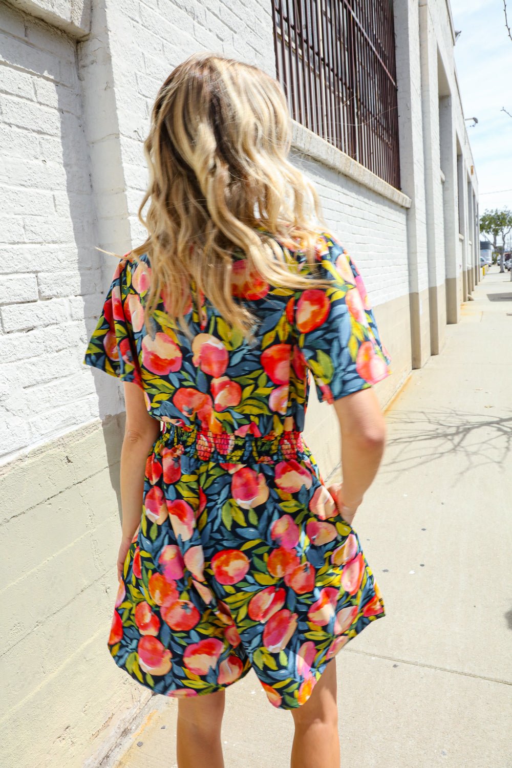 Sunny Days Floral Print Smocked Waist Back Neck Button Romper - Nikki &amp; Co. Boutique