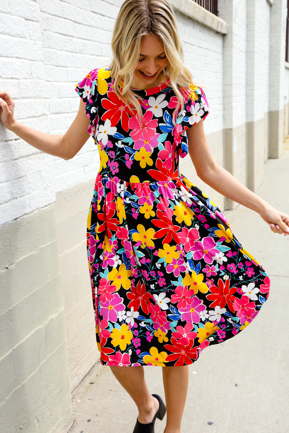 Spread Joy Black &amp; Multicolor Floral Flutter Sleeve Babydoll Dress | Nikki &amp; Co. Boutique