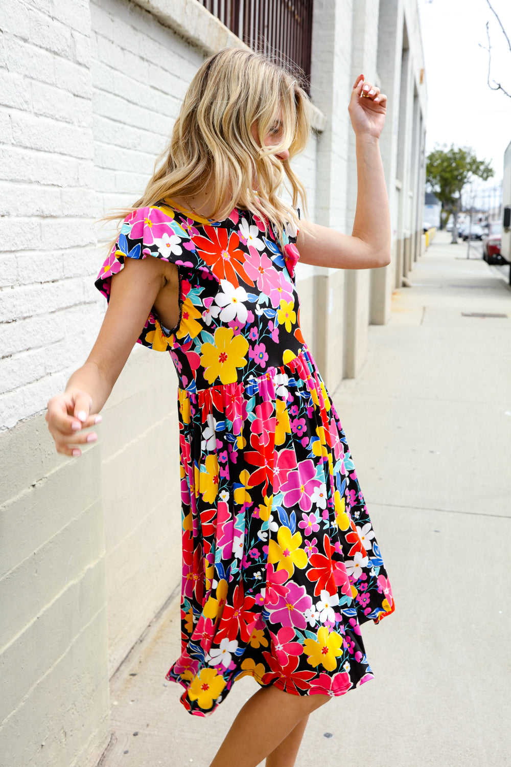 Spread Joy Black &amp; Multicolor Floral Flutter Sleeve Babydoll Dress | Nikki &amp; Co. Boutique