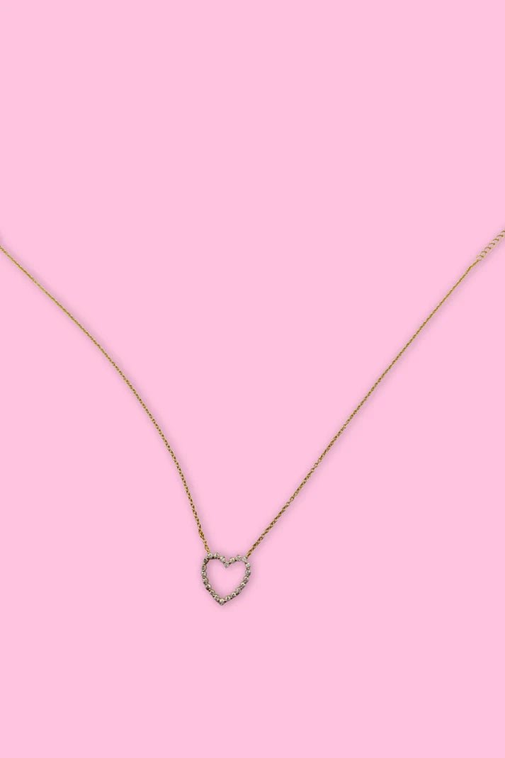 A gold chain with a single heart at the center.