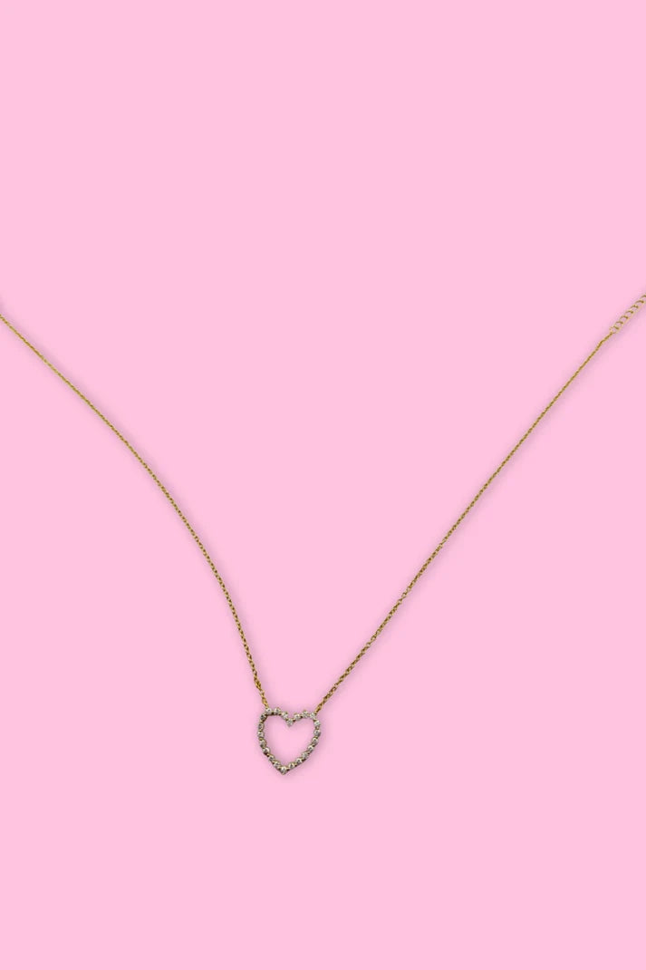 A gold chain with a single heart at the center.
