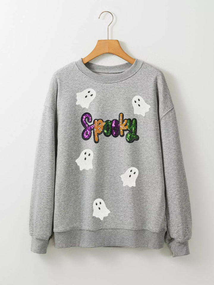 Grey sweatshirt with the word "Spooky" in purple, orange, and green sequence with 5 ghost flying around 
