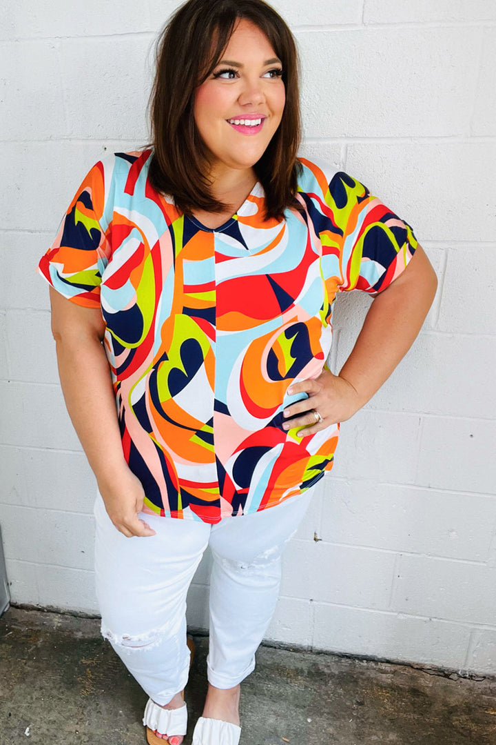 Orange Geometric V Neck Drop Shoulder Tops | Nikki &amp; Co. Boutique