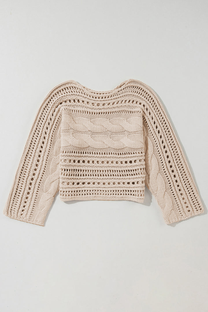 Beige crochet sweater on a light gray background