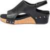 Black sandal with cork sole on a white background