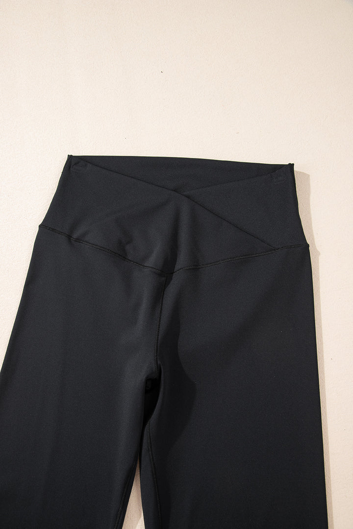 Black pants on a beige background
