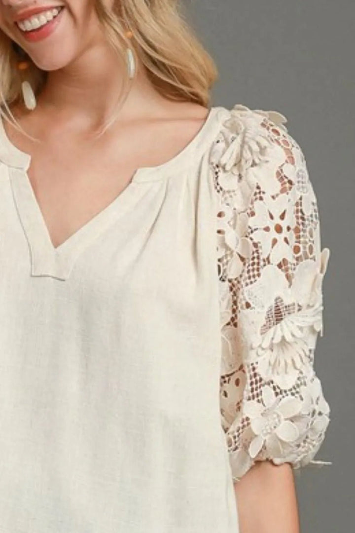 Umgee Full Size French Terry Boxy Cut Top with 3D Floral Sleeve Plus Size - Nikki &amp; Co. Boutique