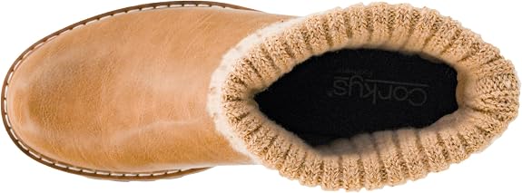 A top-down view of a tan leather bootie with a beige knit trim and a black interior featuring the &