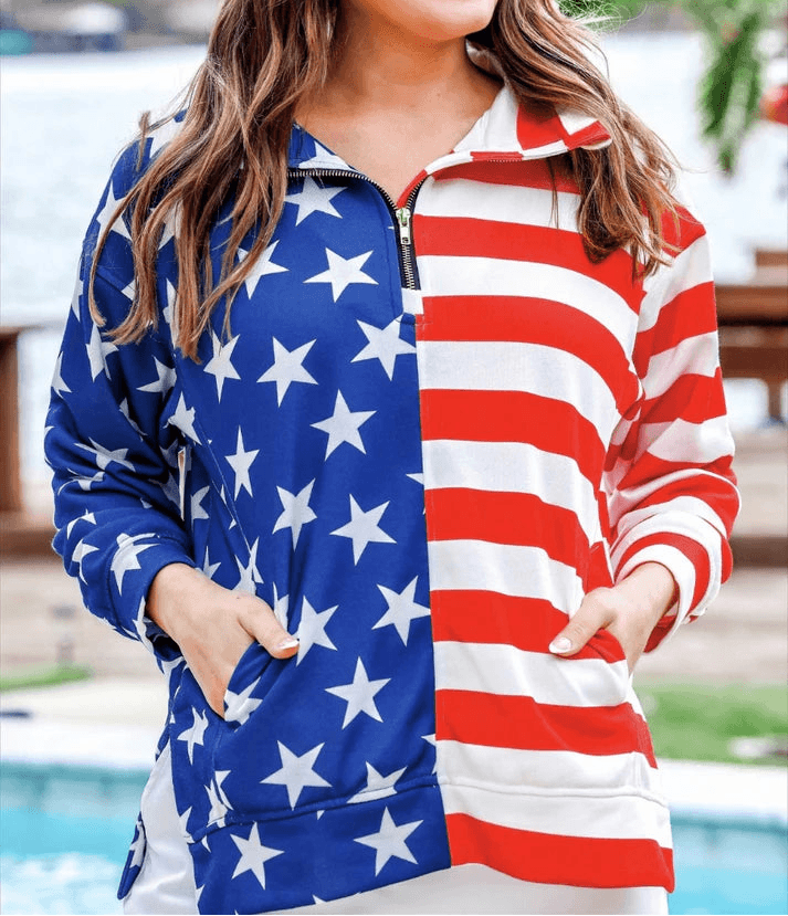 Woman wearing a jacket with Americana design pullover by a poolside.