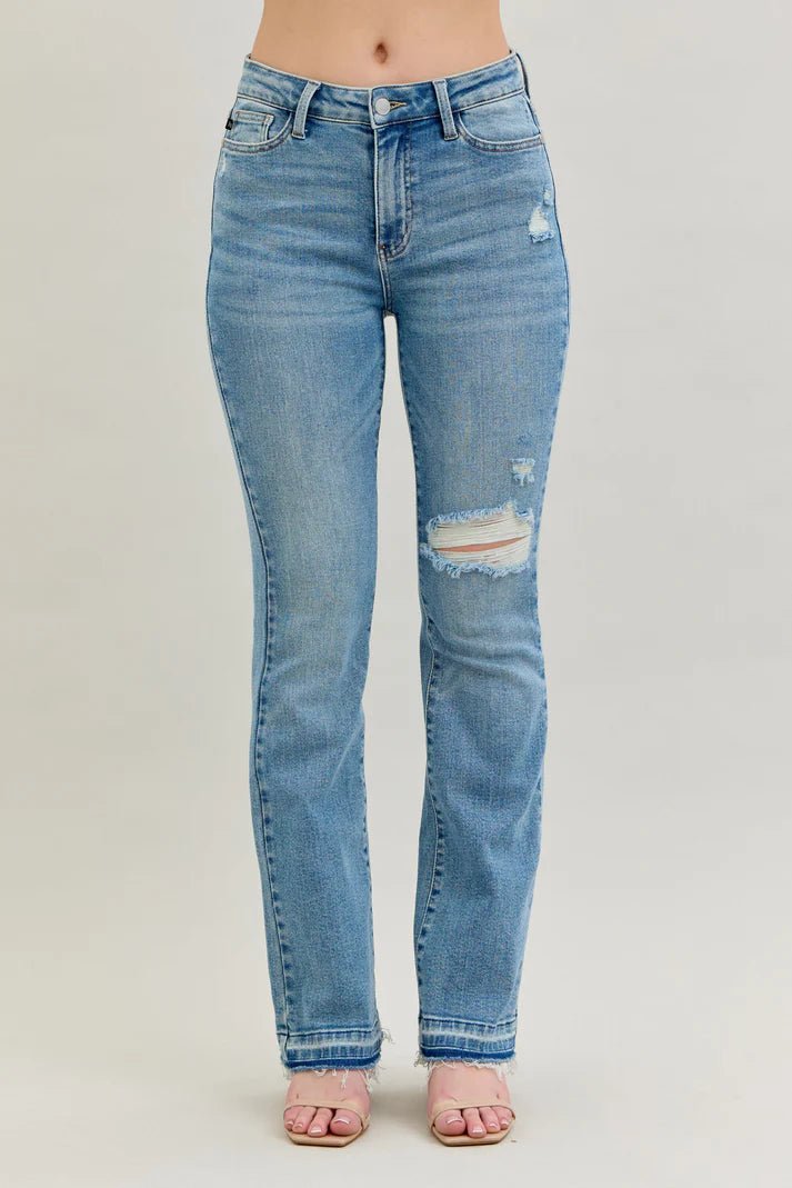 Judy Blue Jeans (NP) - Mid Rise Distressed Release Hem Boot Cut | Nikki &amp; Co. Boutique