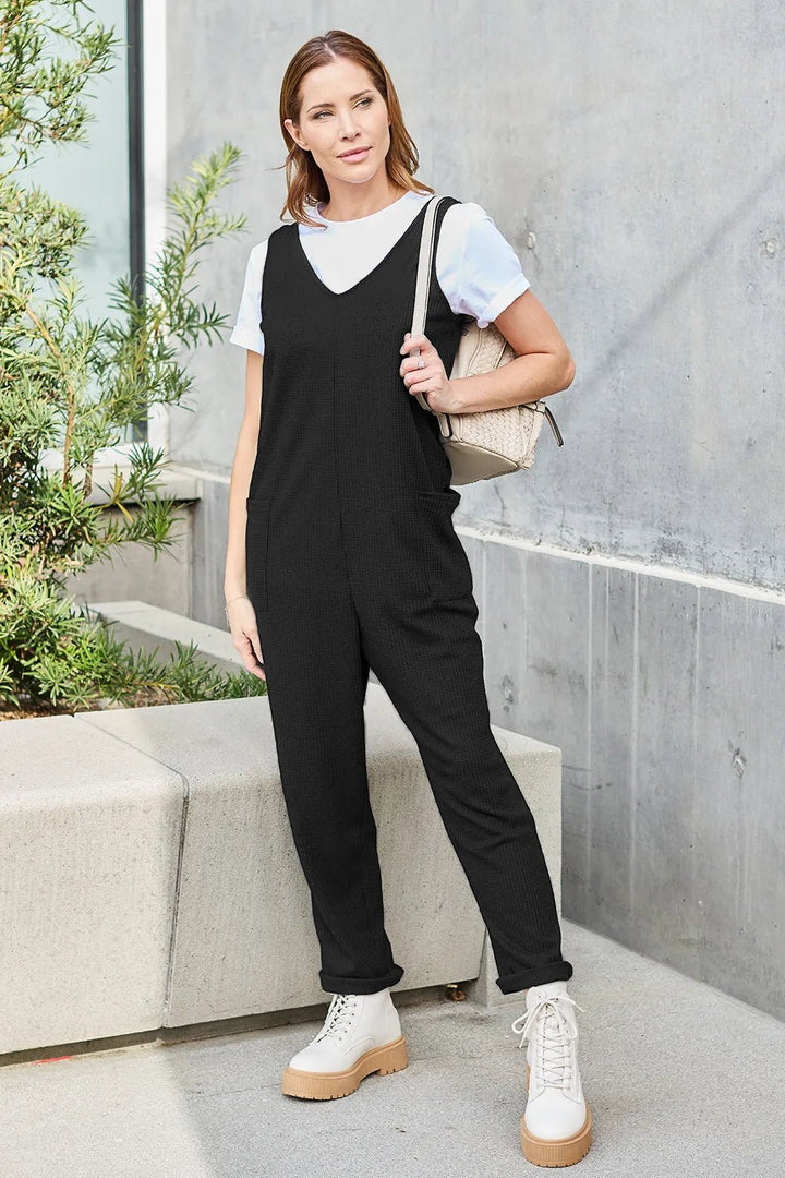 Waffle-Knit Sleeveless V-Neck Jumpsuit with Pockets - Nikki &amp; Co. Boutique