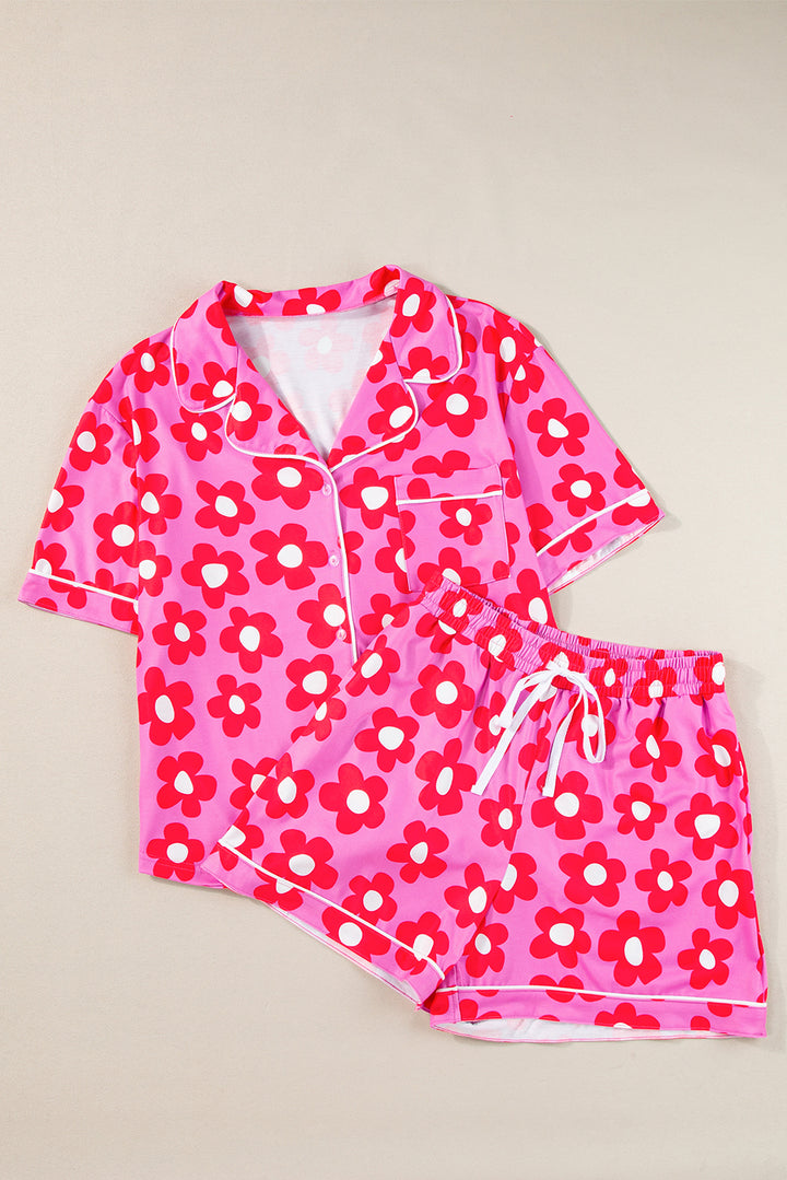 Pink floral pajama set on a beige background