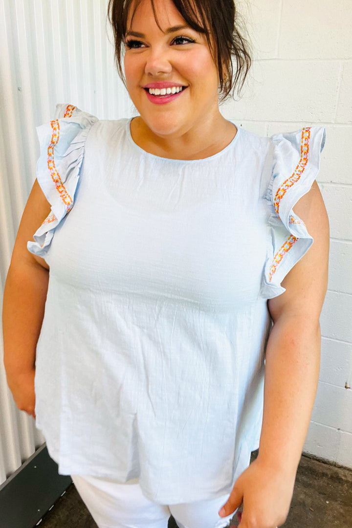 Chambray Embroidered Flutter Sleeve Tops | Nikki &amp; Co. Boutique
