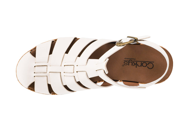 White sandal with brown straps on a white background