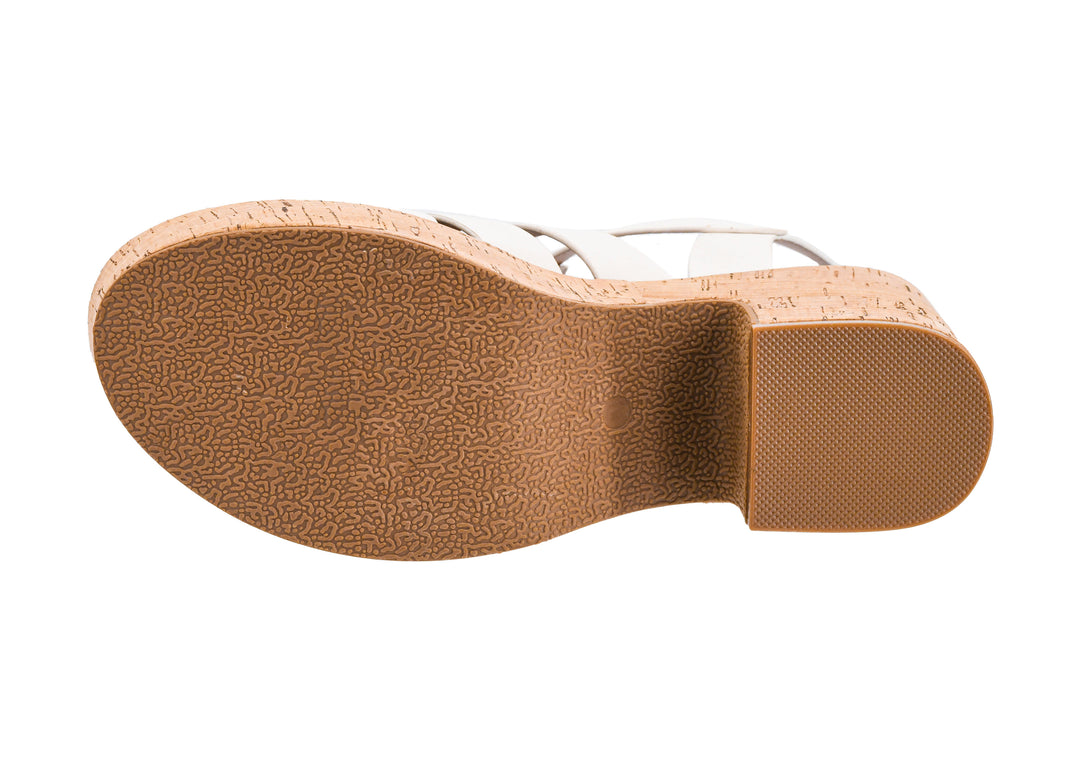 Close-up of a sandal sole with cork insole on a white background