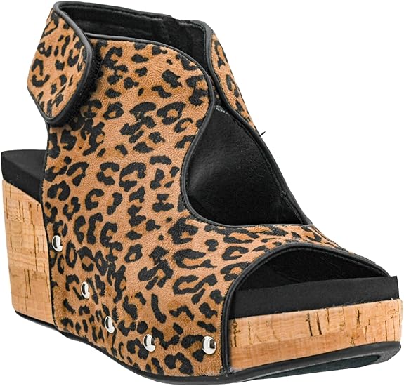 Leopard print wedge sandal with cork sole on a white background