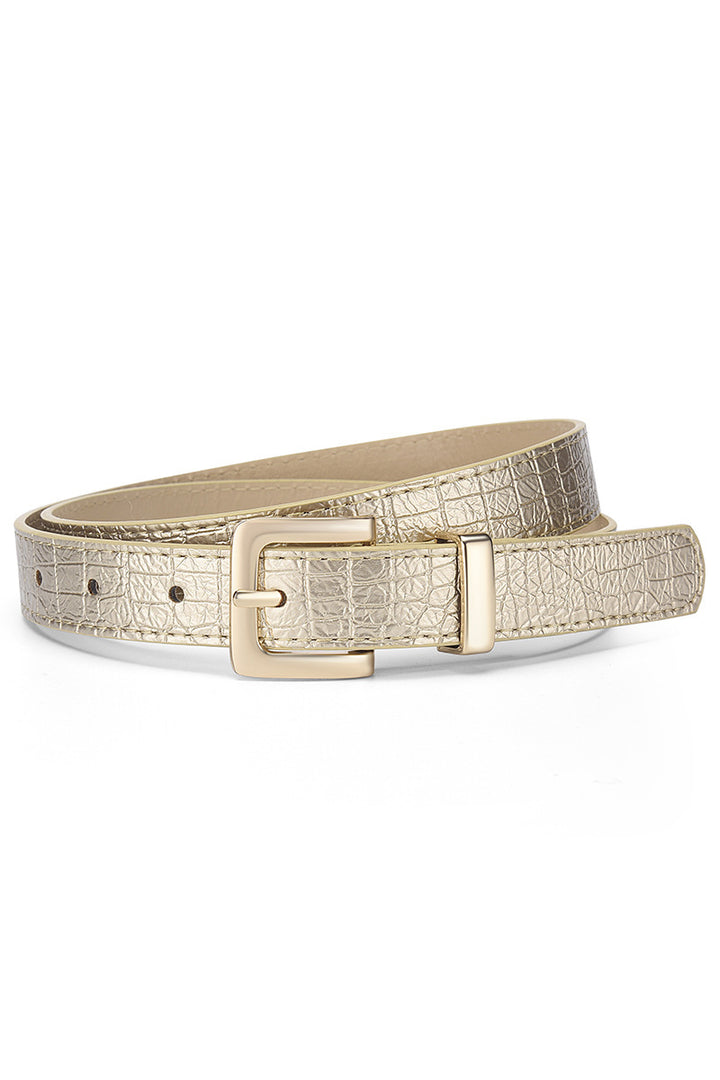 Gold metallic belt with a crocodile pattern on a white background
