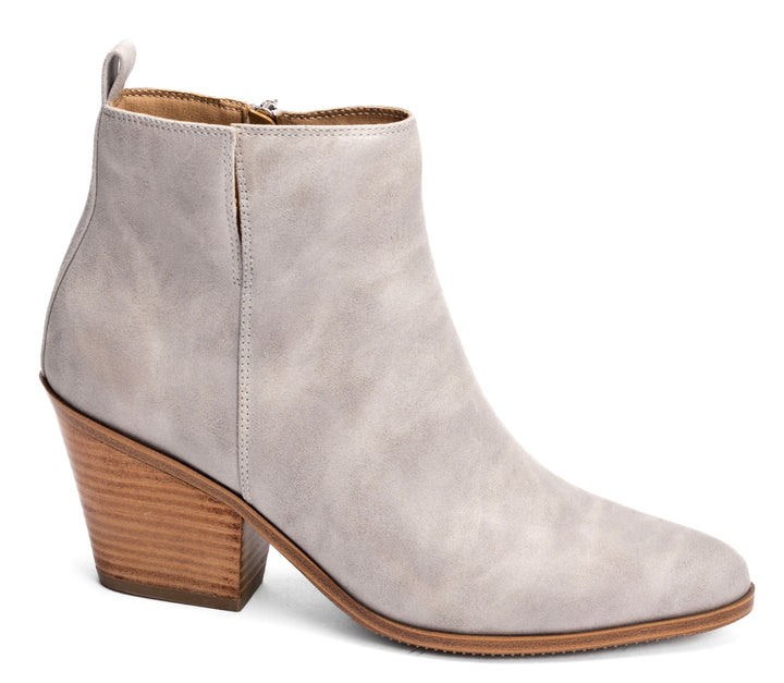 Gray ankle boot with a wooden heel on a white background