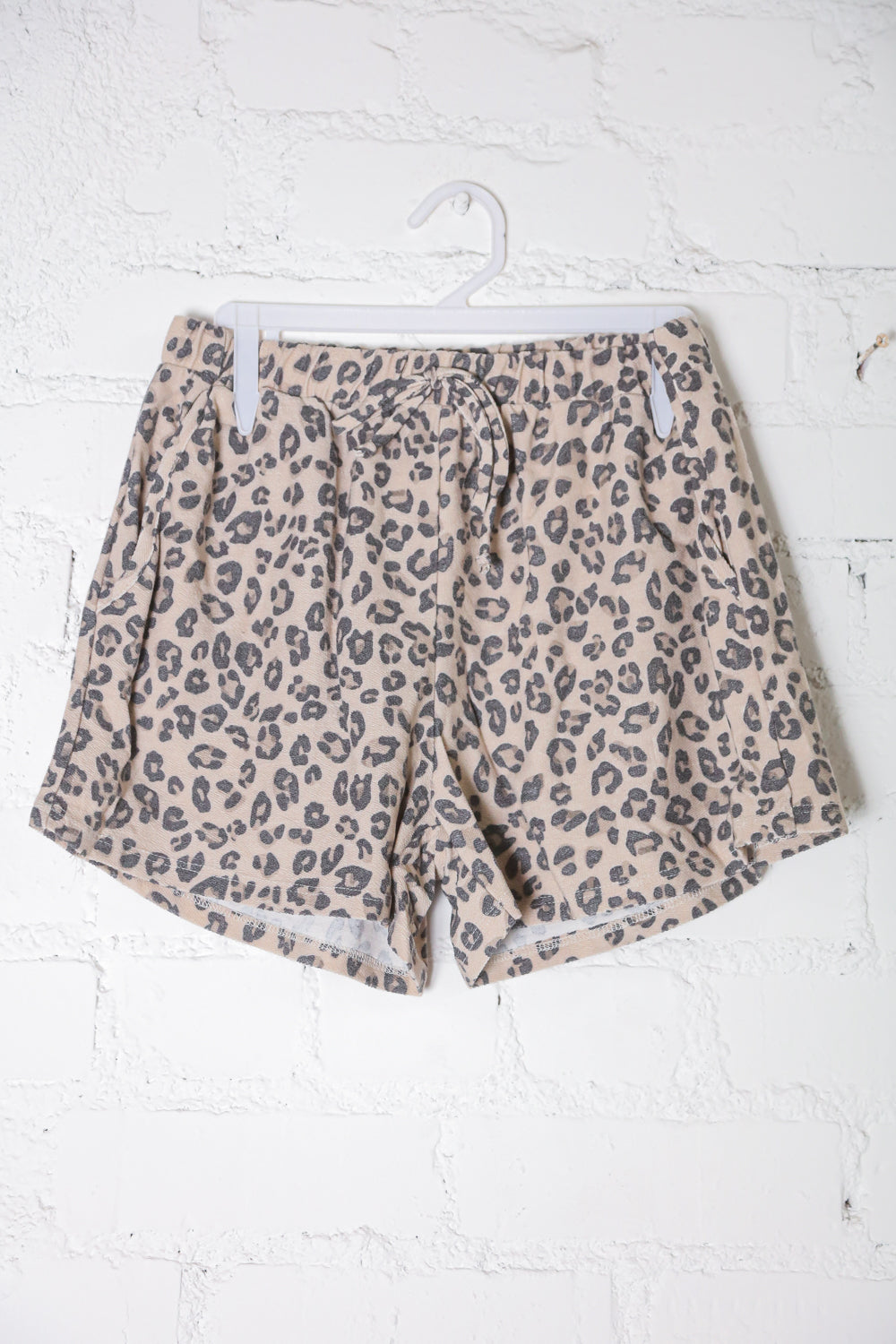 Be Bold Taupe Animal Print French Terry Pocket Shorts | Nikki &amp; Co. Boutique