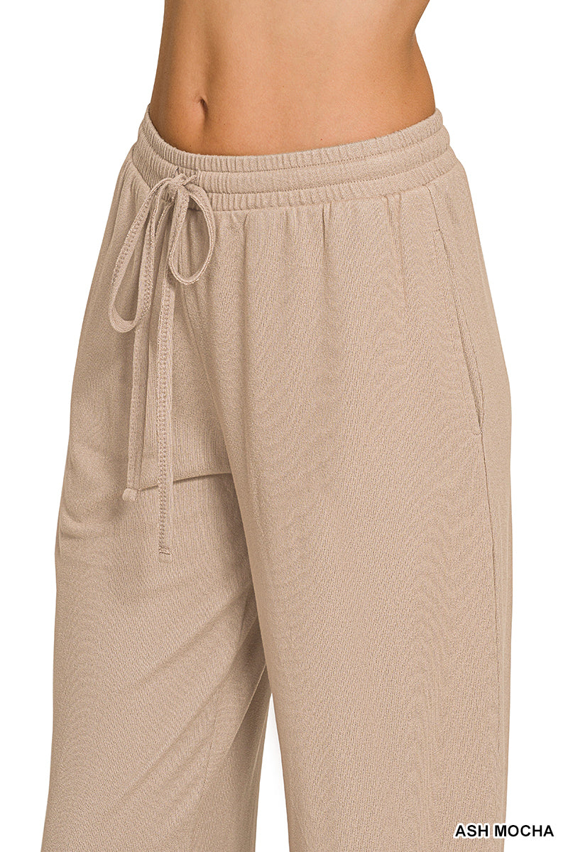 Woman wearing ash mocha pants with drawstring