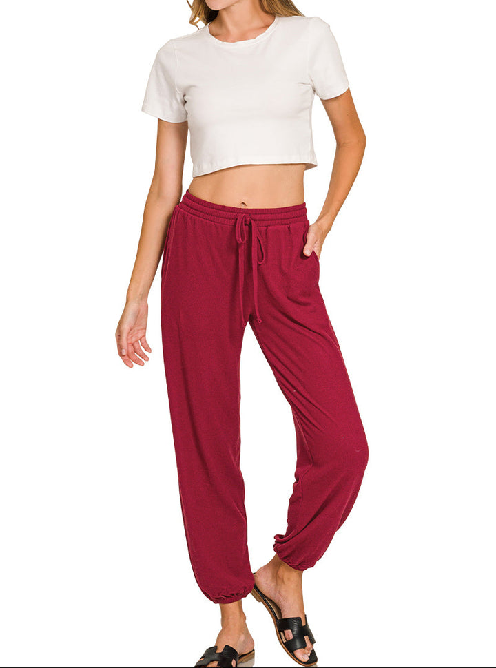Woman in short sleeve top with drawstring pants