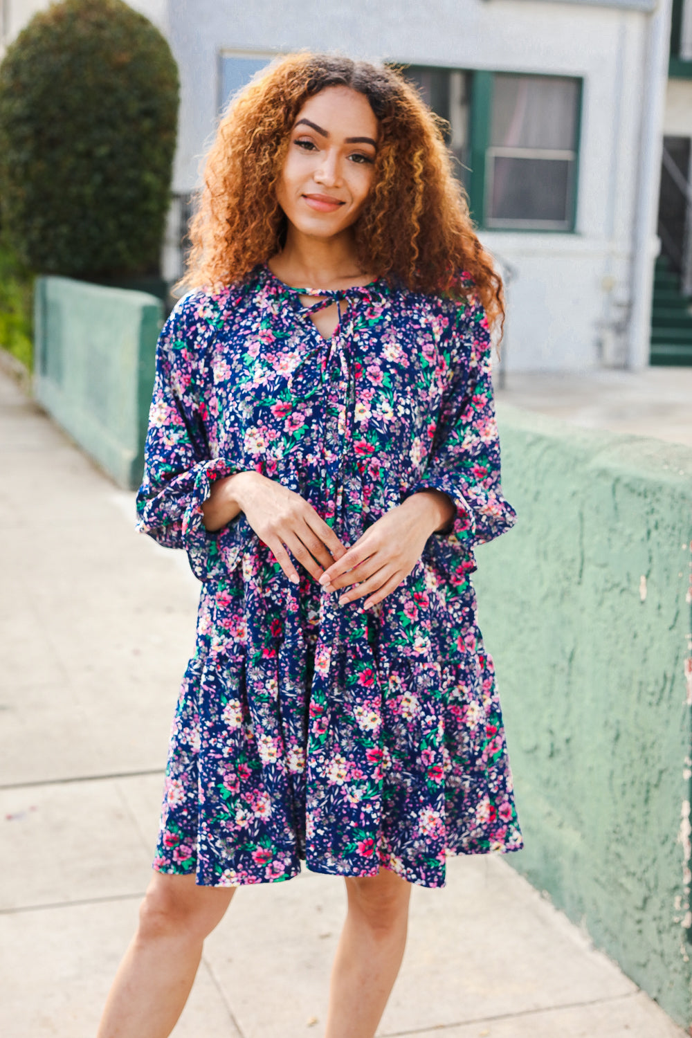 Feeling Joyful Navy Floral Bow Tie Babydoll Long Ruffle Sleeve Dress | Nikki &amp; Co. Boutique