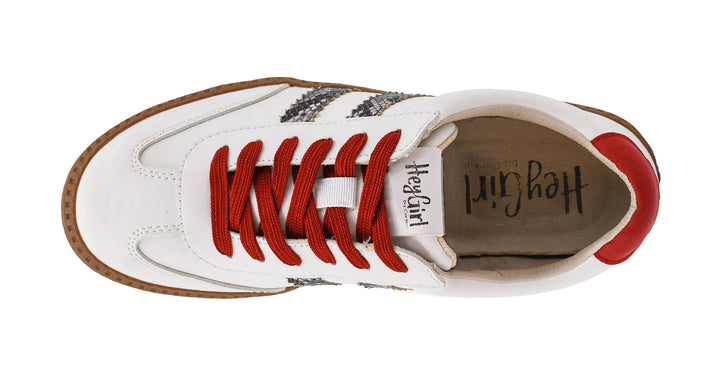 White sneaker with red laces and &