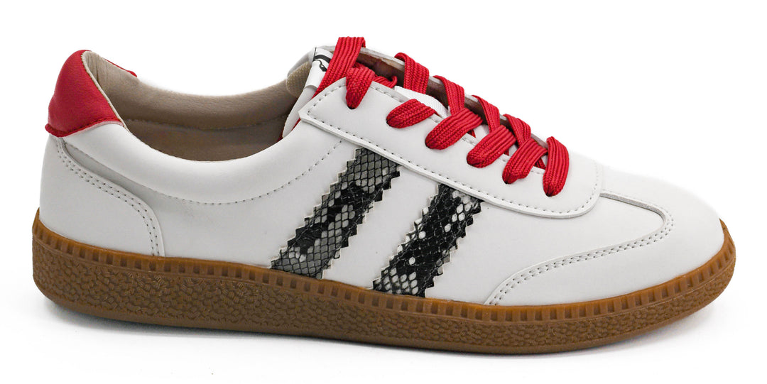 White sneaker with red laces and black snake skin pattern on a white background