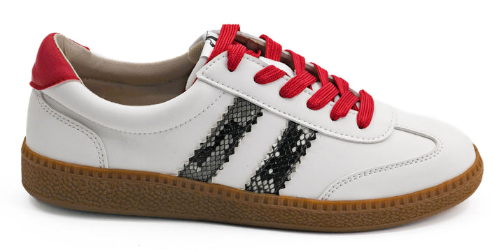 White sneaker with red laces and black snake skin pattern on a white background