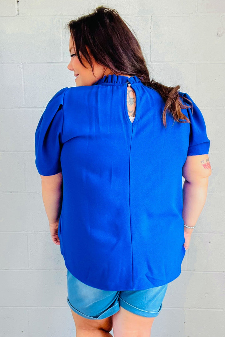 Lovely Blue Frill Mock Neck Woven Tops | Nikki &amp; Co. Boutique