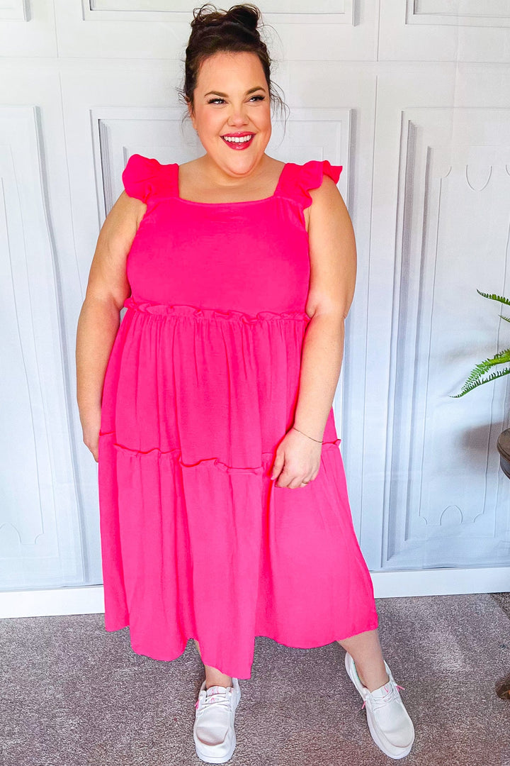 Lots To Love Fuchsia Smocked Flutter Sleeve Tiered Midi Dress | Nikki &amp; Co. Boutique