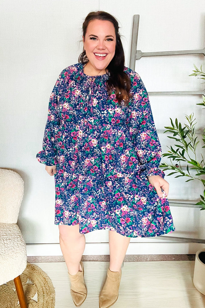 Feeling Joyful Navy Floral Bow Tie Babydoll Long Ruffle Sleeve Dress | Nikki &amp; Co. Boutique
