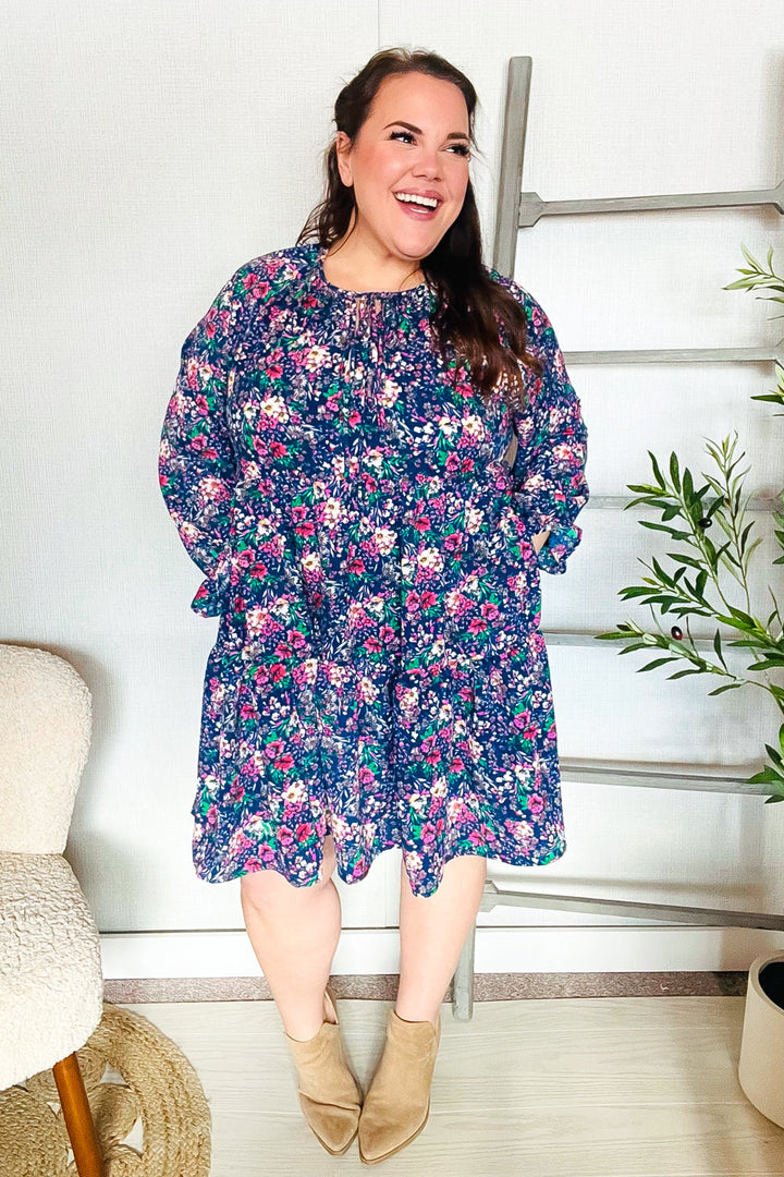 Feeling Joyful Navy Floral Bow Tie Babydoll Long Ruffle Sleeve Dress | Nikki &amp; Co. Boutique