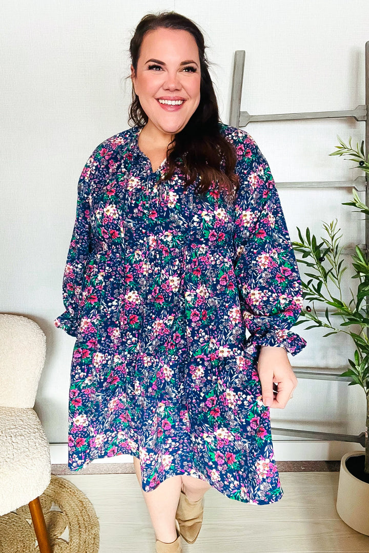 Feeling Joyful Navy Floral Bow Tie Babydoll Long Ruffle Sleeve Dress | Nikki &amp; Co. Boutique