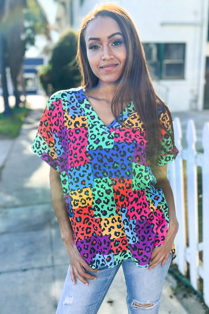 Dazzle in Multicolor Animal Patchwork V Neck Dolman Cap Sleeve Top | Nikki &amp; Co. Boutique