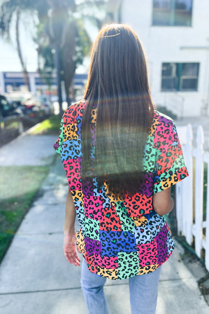 Dazzle in Multicolor Animal Patchwork V Neck Dolman Cap Sleeve Top | Nikki &amp; Co. Boutique