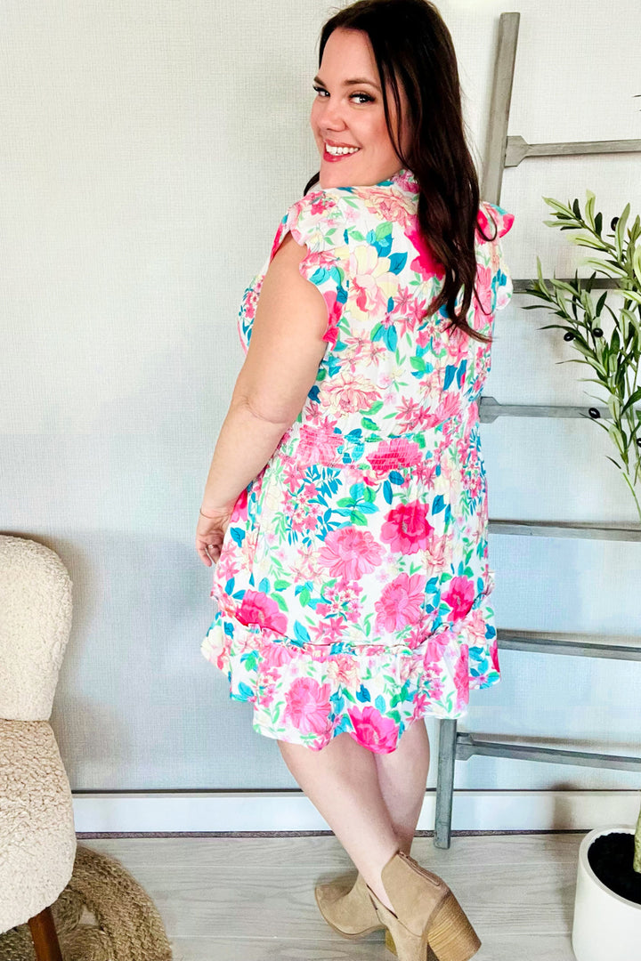 Under Your Spell Floral Smocked Flutter Sleeve Ruffle Mini Dress | Nikki &amp; Co. Boutique