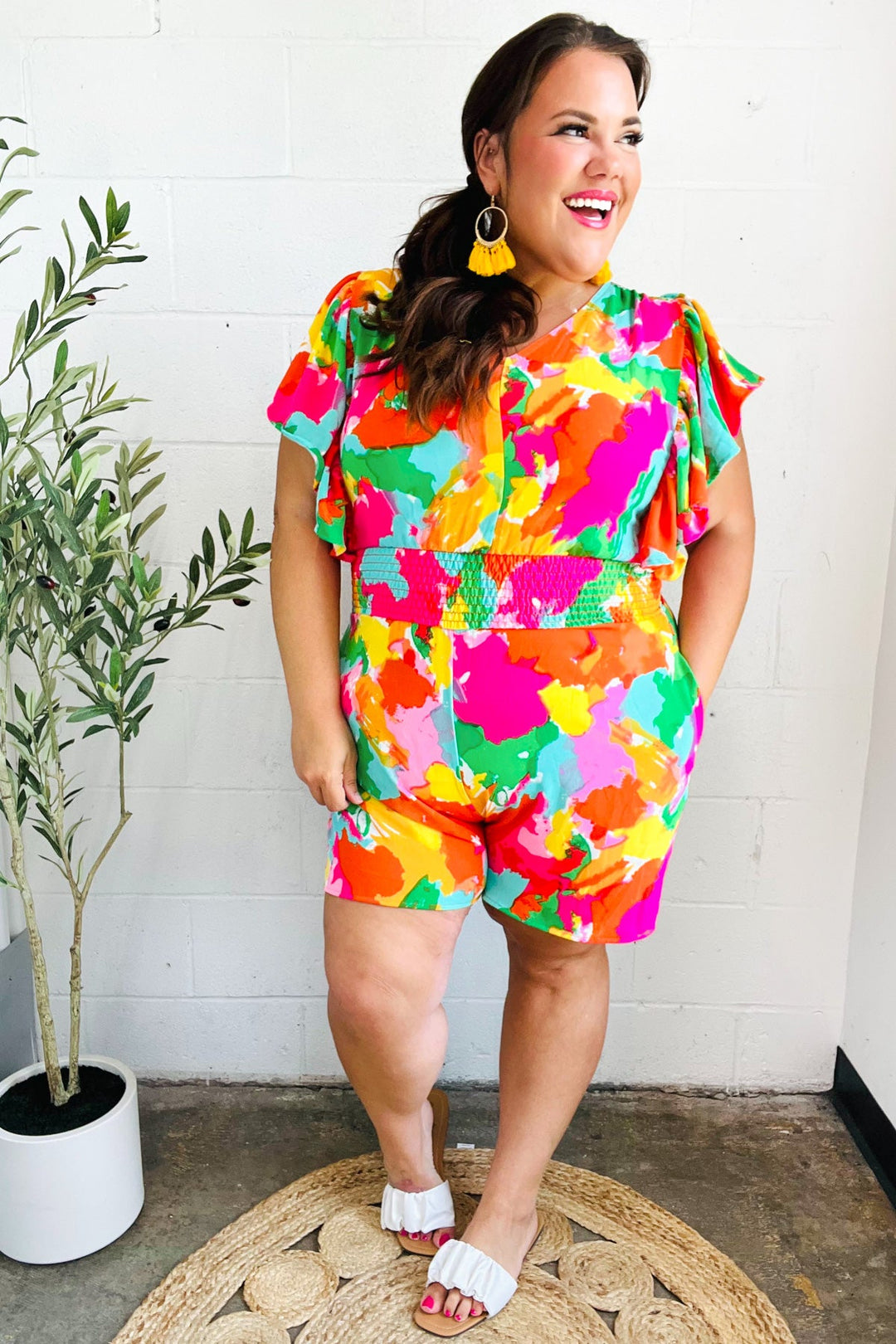 Under The Sun Abstract Floral Smocked Waist V Neck Flutter Sleeve Romper | Nikki &amp; Co. Boutique