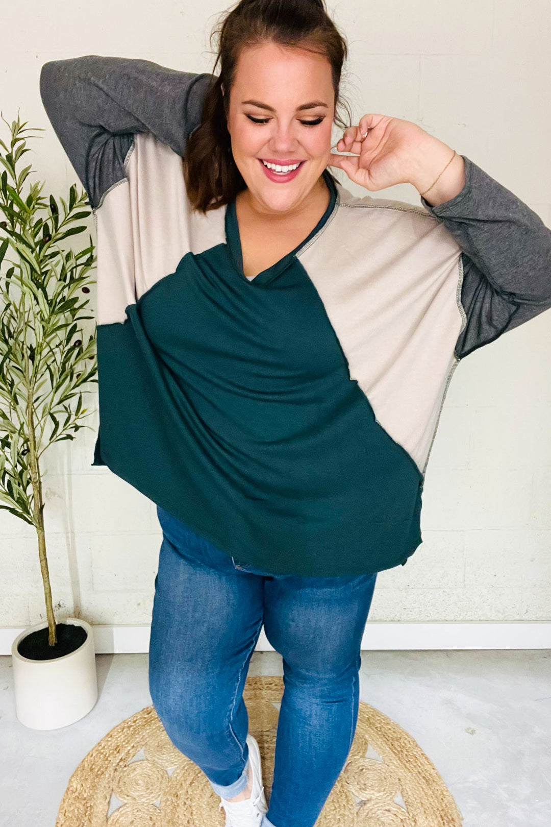 Stand Out Hunter Green V Neck Raglan Color Block Outseam Top | Nikki &amp; Co. Boutique