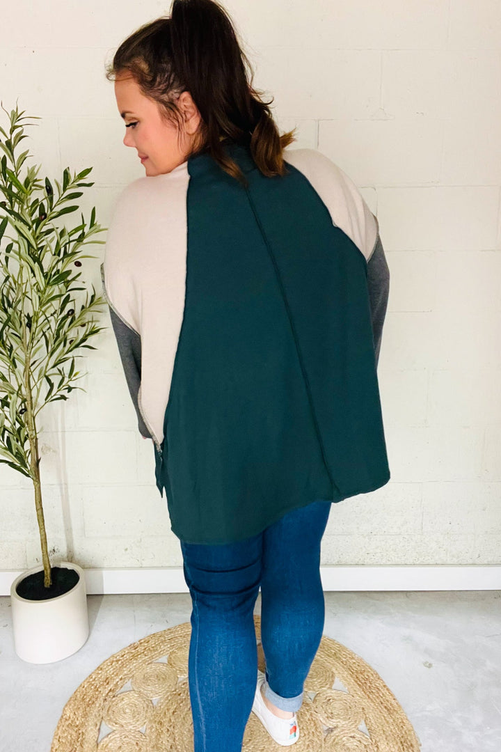 Stand Out Hunter Green V Neck Raglan Color Block Outseam Top | Nikki &amp; Co. Boutique