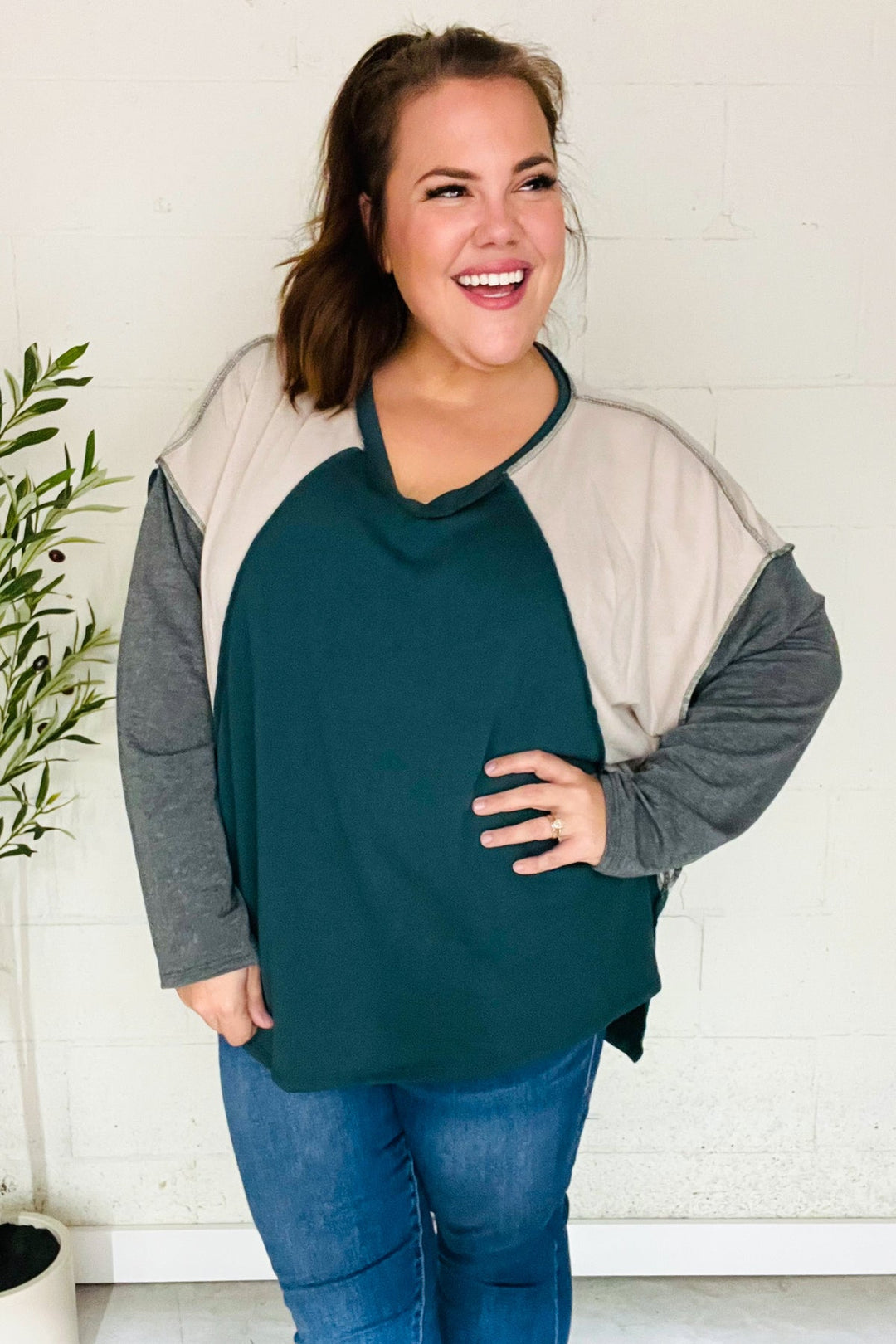 Stand Out Hunter Green V Neck Raglan Color Block Outseam Top | Nikki &amp; Co. Boutique